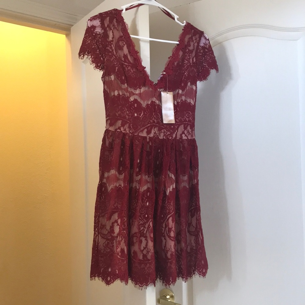 Francesca’s dark red dress